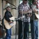 Issac Moore sharing a song with Don Rigsby at Back 40 Bluegrass (9/12) - photo by Brian Dietz