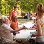 J.D. Crowe enjoys a chat with fans at Bean Blossom 2012 - photo © MaryE Yeomans