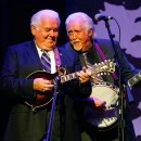 Paul Williams and J.D. Crowe share a funny at the 2011 IBMA Awards - photo © Dean Hoffmeyer