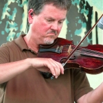 Mike Hartgrove with Lonesome River Band at ROMP 2012 - photo by Woody Edwards