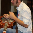 Chad Graves warming up before the Slidegras Extravaganza at World of Bluegrass 2012 - photo by David Morris