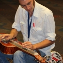 Chad Graves warming up before the Slidegras Extravaganza at World of Bluegrass 2012 - photo by David Morris