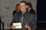 Caleb Smith with Balsam Rage's trophy for the 2011 IBMA Song of the Year - photo © Roy Swann Caleb Smith with Balsam Rage's trophy for the 2011 IBMA Song of the Year - photo © Roy Swann