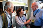 Terry and Cindy Baucom greet George Shuffler at IBMA 2011 - photo © Dean Hoffmeyer Terry and Cindy Baucom greet George Shuffler at IBMA 2011 - photo © Dean Hoffmeyer