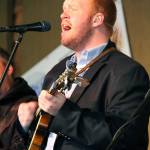 Jesse Smathers with Lonesome River Band at the 2016 Doyle Lawson & Quicksilver Bluegrass Festival - photo © Laura Tate Photography