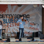 Evan Ward and Patrick McAvinue with Audie Blaylock at the May 2016 Gettysburg Bluegrass Festival - photo by Frank Baker