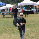 Moore Brothers roaming the grounds at Red, White & Bluegrass 2012 - photo © Laura Tate Photography