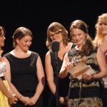 Della Mae presenting at the 2012 IBMA Awards Show - photo by Dan Loftin