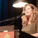 Nancy Cardwell welcomes everyone to the 2012 IBMA Nominations event - photo by Collin Peterson
