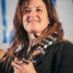 Kristin Andreassen with Uncle Earl at the 2016 Delaware Valley Bluegrass Festival - photo by Frank Baker