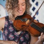 Rayna Gellert with Uncle Earl at the 2016 Delaware Valley Bluegrass Festival - photo by Frank Baker
