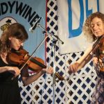 Stephanie Coleman and Rayna Gellert with Uncle Earl at the 2016 Delaware Valley Bluegrass Festival - photo by Frank Baker