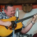 Adam McIntosh with Dry Branch Fire Squad at the Gettysburg Bluegrass Festival, August 2016 - photo by Frank Baker