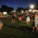 Hooping it up at the August 2016 Gettysburg Bluegrass Festival - photo by Frank Baker