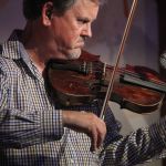 Mike Hartgrove with Lonesome River Band at the August 2016 Gettysburg Bluegrass Festival - photo by Frank Baker