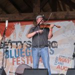 Caleb Cox spins with Nothin' Fancy at the August 2016 Gettysburg Bluegrass Festival - photo by Frank Baker