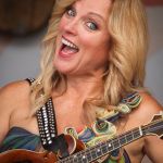 Rhonda Vincent & The Rage gives the big smile when she realizes she is being photographed for Bluegrass Today at the August 2016 Gettysburg Bluegrass Festival - photo by Frank Baker