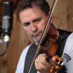 Glen Harrell with Volume Five at the August 2016 Gettysburg Bluegrass Festival - photo by Frank Baker