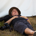 Staff photographer taking a cat nap at Grey Fox 2016 - photo © Tara Linhardt