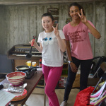 Alisa Inaba and her friend Kaira cooking for the attendees at KazCamp 2016