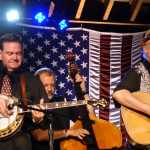 Joe Mullins joins The Seldom Scene for an impromptu James King tribute at the 2016 Musicians Against Childhood Cancer festival - photo by Daniel Mullins