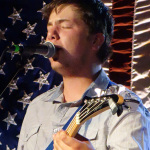 Caleb Cox with Blue Highway at the 2016 Musicians Against Childhood Cancer festival - photo by Daniel Mullins