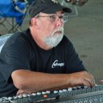 Jimmy Kittle runs sound at the 2016 Marshall Bluegrass Festival in Michigan - photo © Bill Warren