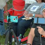 Kimberly Williams broadcasting on Facebook at the 2016 Milan Bluegrass Festival - photo © Bill Warren