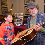 Wayne Henderson shows off a guitar at RenoFest 2016 - photo by Mike Lane