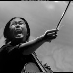 Joseph Kwon with The Avett Brothers at the Legendary Giveback (10/19/12) - photo © G. Milo Farineau