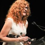 Becky Buller accepting her Fiddle Player of the Year Award at the 2016 International Bluegrass Music Awards - photo by Frank Baker