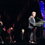 Bryan Sutton accepting his Guitar Player of the Year Award at the 2016 International Bluegrass Music Awards - photo by Frank Baker