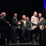 Joe Mullins & The Radio Ramblers accepting their Gospel Record Performance of the Year Award at the 2016 International Bluegrass Music Awards - photo by Frank Baker