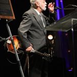 Roland White accepting his brother Clarence's induction at the 2016 International Bluegrass Music Awards - photo by Frank Baker