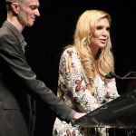 John Virant and Alison Krauss speak during the Hall of Fame induction for Rounder Records founders at the 2016 International Bluegrass Music Awards - photo by Frank Baker