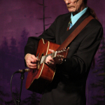 Tony Rice at the Bluegrass Album Band reunion show at Bluegrass First Class (2/16/13) - photo by John Goad