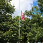 Flag at half staff at the 2016 Bluegrass Bluegrass on the Grass festival on the campus of Dickinson College - photo by Frank Baker