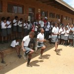 South African schoolchildren dance during a visit from the 2012 Banjo Safari crew - photo by Kevin Dooley