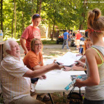 J.D. Crowe enjoys a chat with fans at Bean Blossom 2012 - photo © MaryE Yeomans