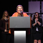 Murphy Henry accepts her Distinguished Achievement award at World of Bluegrass 2015 - photo by Becky Johnson