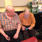 Ernie Sykes and Roland White checking photos in the studio working on Becky Buller's new album (3/25/14)