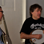 Béla Fleck demonstrates the oft-rumored "way up the neck" technique at Berklee - photo 2011 by David Hollender
