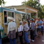 Lining up for grub at the 2015 Bloomin' Bluegrass Festival & Chili Cookoff - photo © Bob Compere