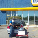 Don Clark picking up a new battery for The Bluegrass Bus before a trip to Thomas Point Beach - August 2012