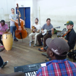 Henhouse Prowlers jamming with local artists in the Congo