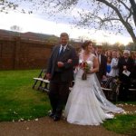 Herb Sandker escorts his daughter, Tensel, down the walkway at her wedding to Brent Burke (April 14, 2013)