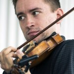 Daniel Collier with Coyote Hill Bluegrass at the 2014 Bluegrass and Chili Festival - photo by Tom Dunning