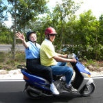 Lorraine Jordan's parents on their moped tour of Cozumel during the Traditional Bluegrass Cruise- photo by Julie King
