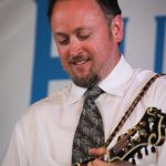 Jesse Brock with The Gibson Brothers at the 2015 Delaware Valley Bluegrass Festival - photo by Frank Baker