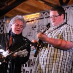 Marty Stuart and Ryan Paisley jam on Monroe tunes at the 2015 Delaware Valley Bluegrass Festival - photo by Frank Baker